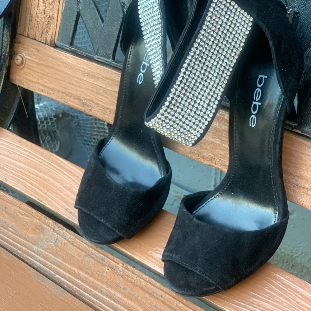 Bebe black suede  heels with stud embellished by the ankle of shoes